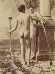 Two Male Youths Holding Palm Fronds